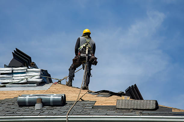 Professional Gutter Installation technician working in Elwood, NY